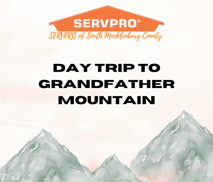 “Day trip to grandfather mountain” with watercolor mountains and the SERVPRO logo