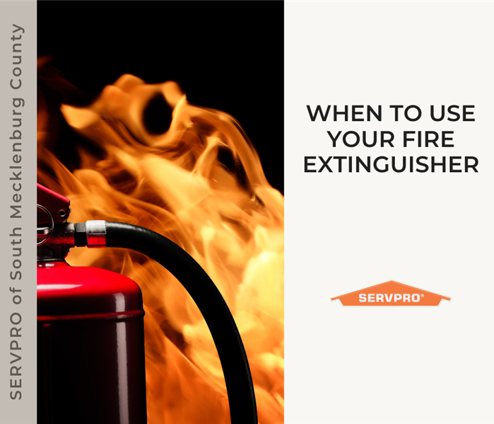 "when to use your fire extinguisher" with a fire extinguisher in front of flames