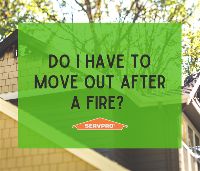 “Do I Have to Move Out After A Fire?” with fire-damaged house and SERVPRO logo