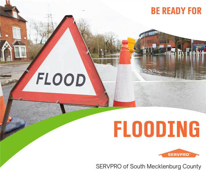 “Be ready for flooding” with a picture of a flooded road and sign that says “flood” with SERVPRO logo