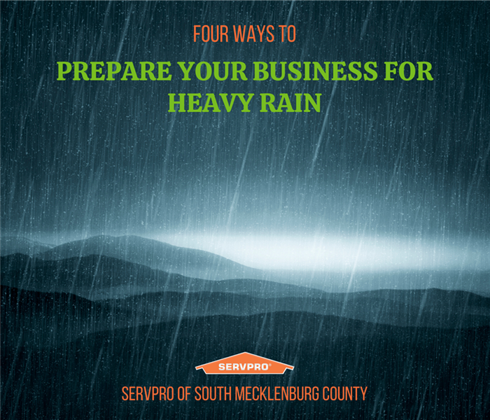 “Four ways to prepare your business for heavy rain” with a rainy mountain range and the SERVPRO logo